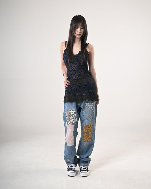 11 PATCHED DENIM PANTS