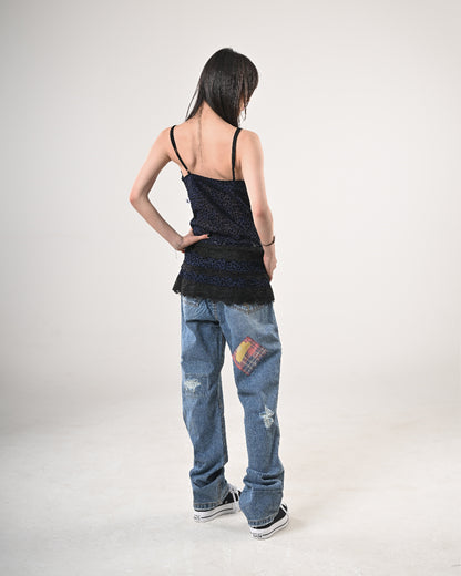 11 PATCHED DENIM PANTS